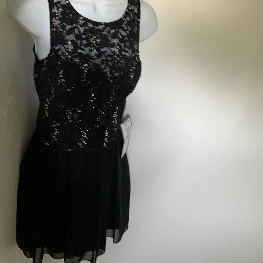 Speechless semi-formal dress